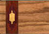 Yellowheart, purpleheart, paduak and machice inlay on Oak